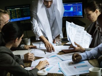 Group of business people working together in a meeting room